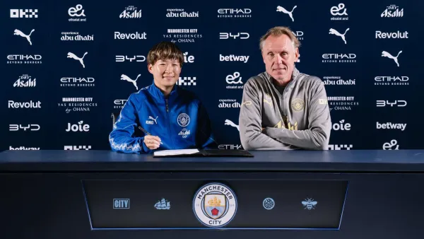 Fujino signs new City deal